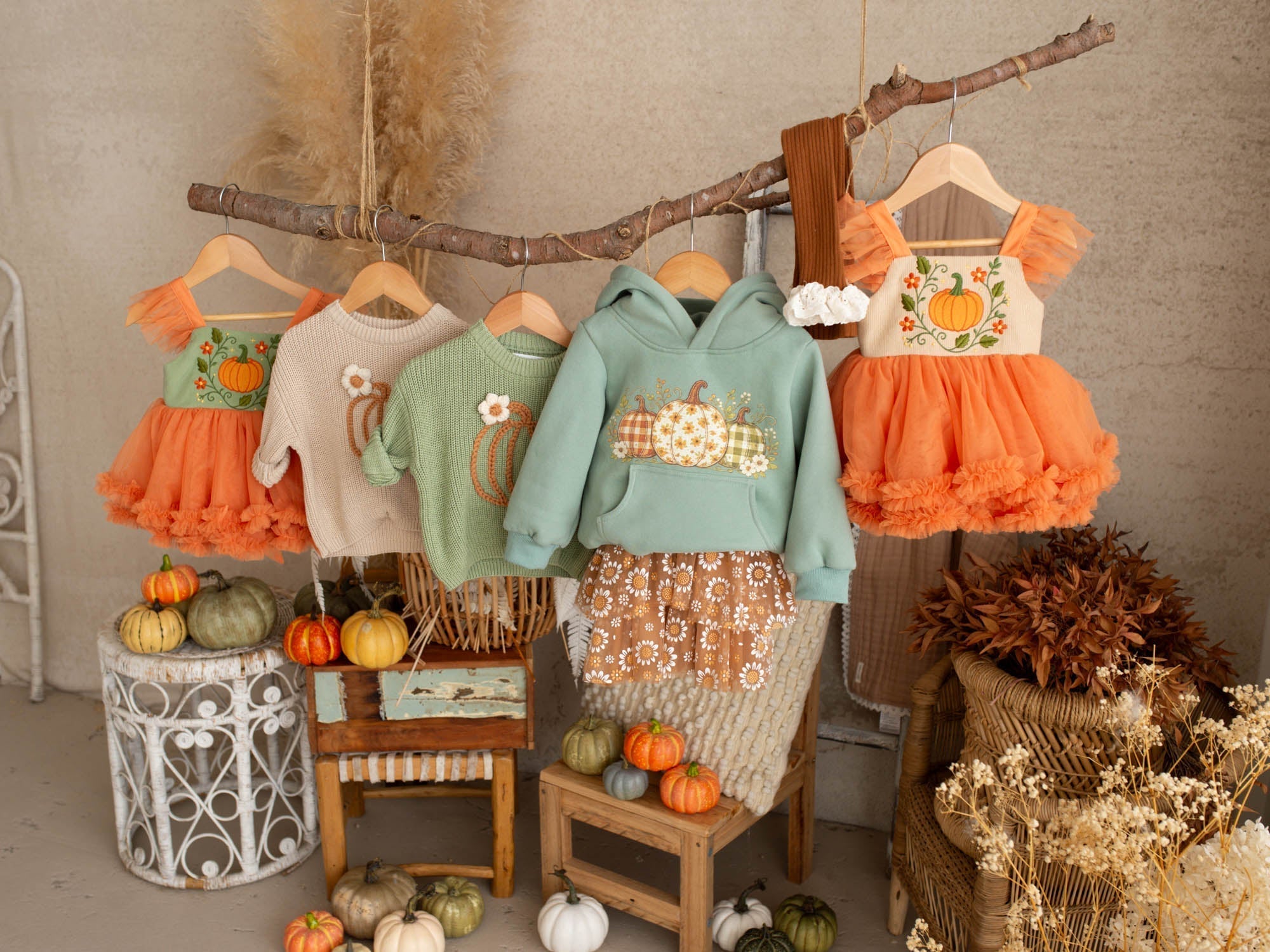 Pumpkin patch outfits for girls with pumpkin dresses, sweaters and hoodies