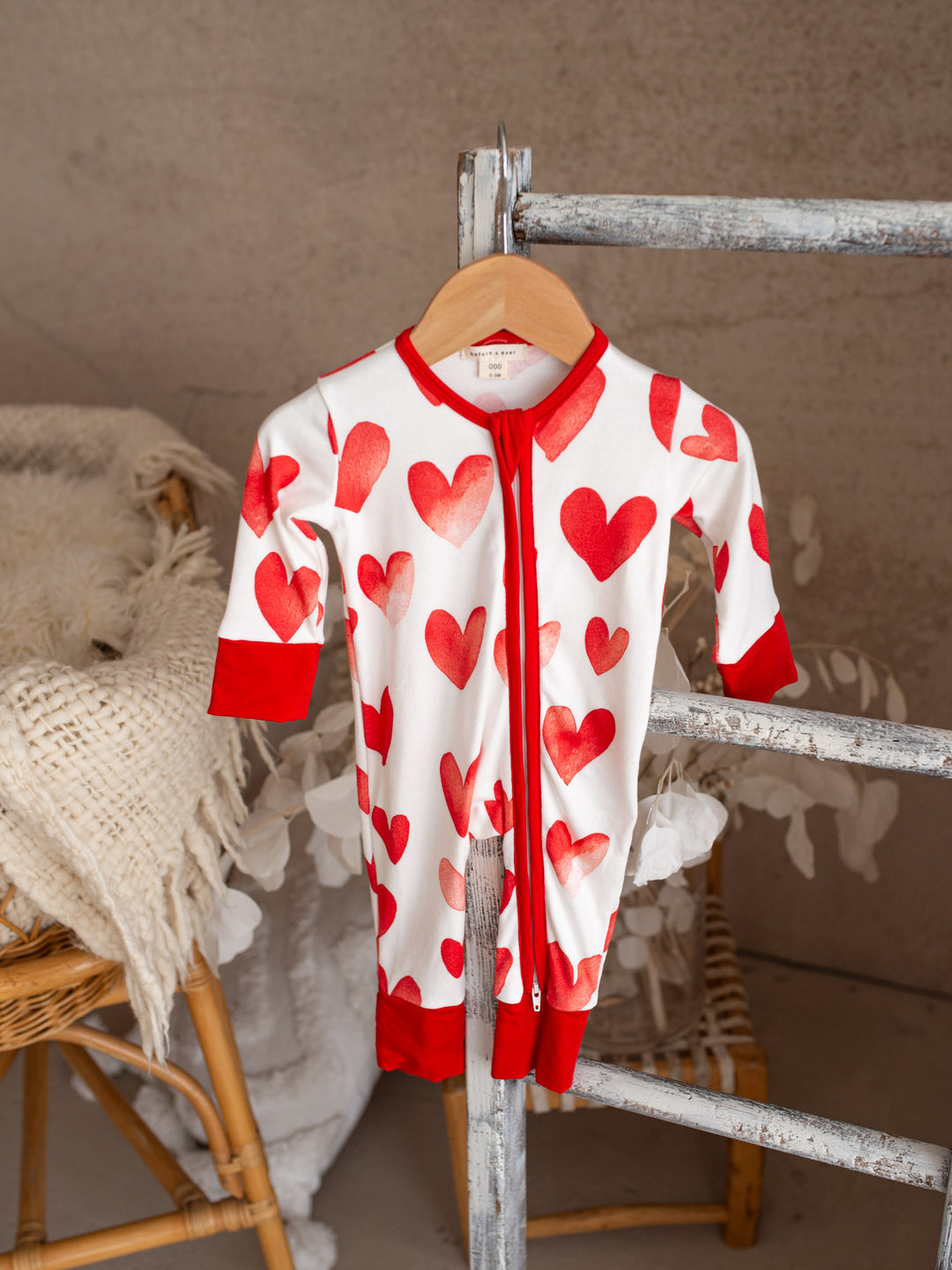 Love You More – Red Heart Onesie
