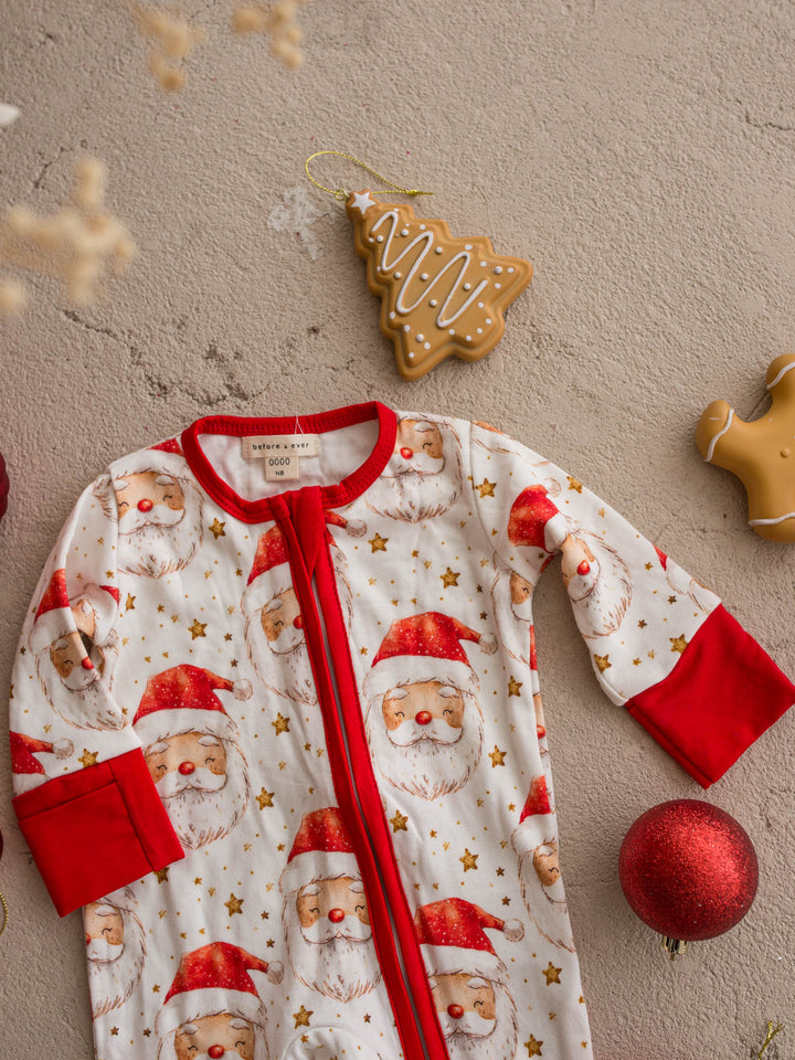 All I Wish Dear Santa baby onesie, watercolour Santa faces and gold stars on cream - Before & Ever Kids