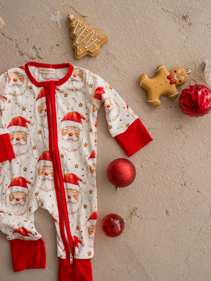 All I Wish Dear Santa baby onesie, watercolour Santa faces and gold stars on cream - Before & Ever Kids