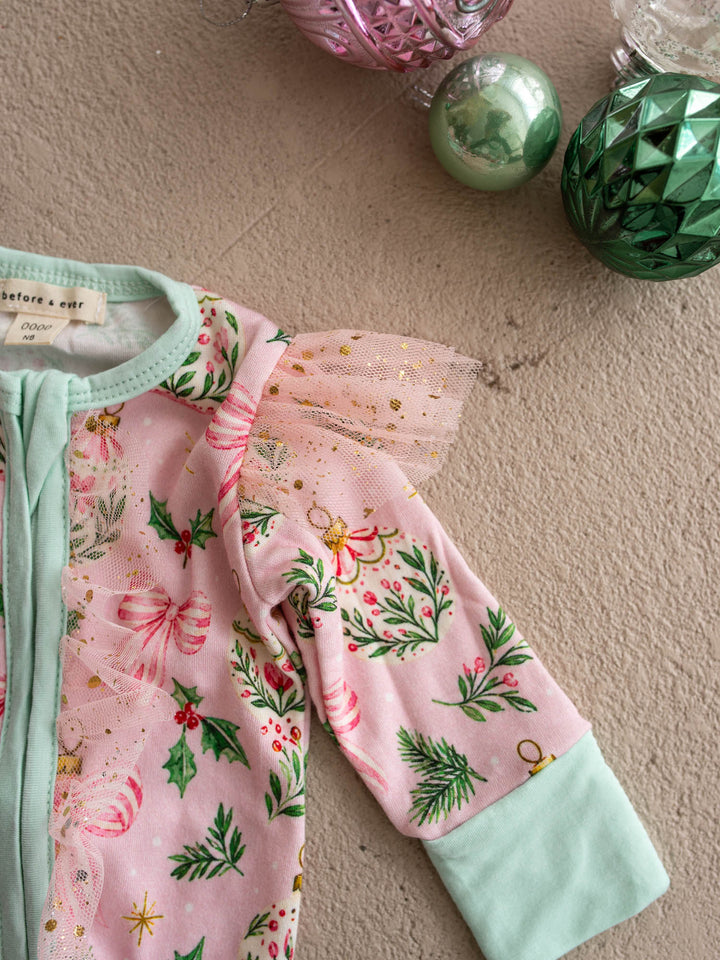 All I Wish Pink Holly baby onesie, holly, gold baubles and bows on pink with mint cuffs - Before & Ever Kids