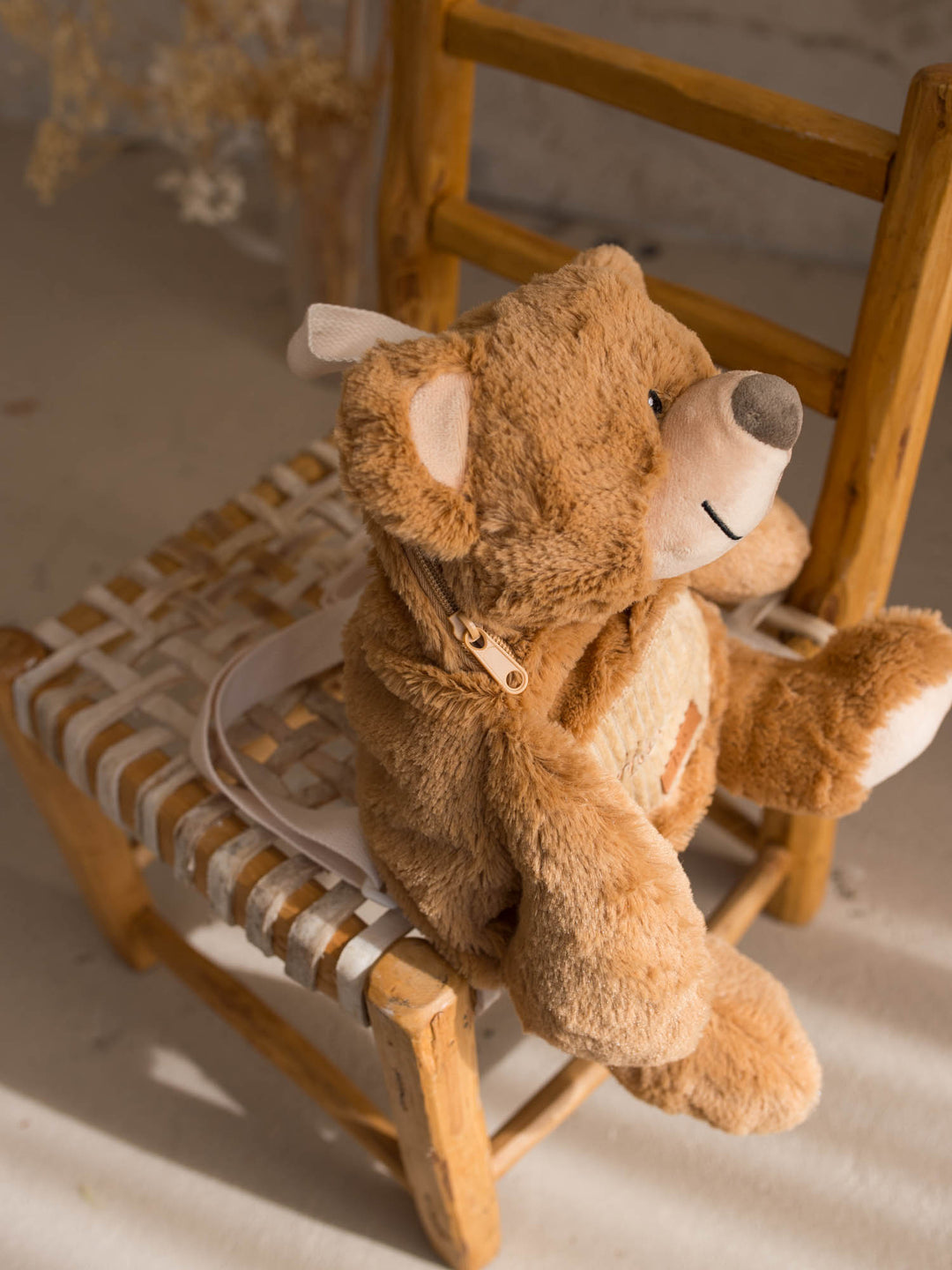 Beau the Bear plush backpack for kids, side view showing the zip opening - Before & Ever Kids