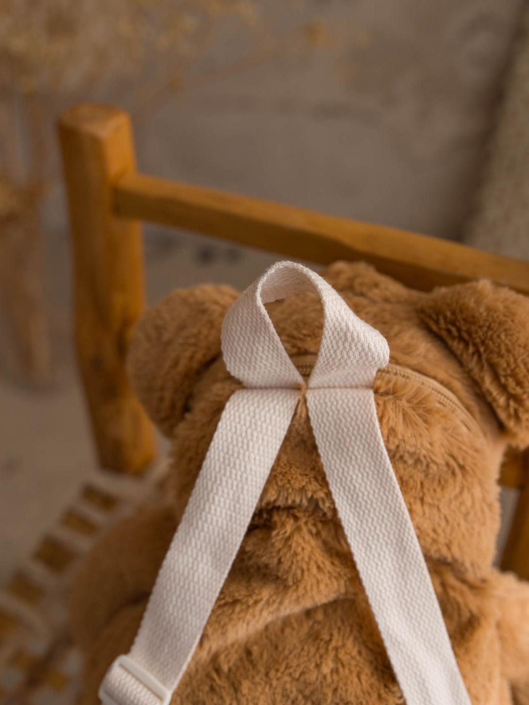 Beau the Bear plush backpack for kids, close up of the strap detail - Before & Ever Kids