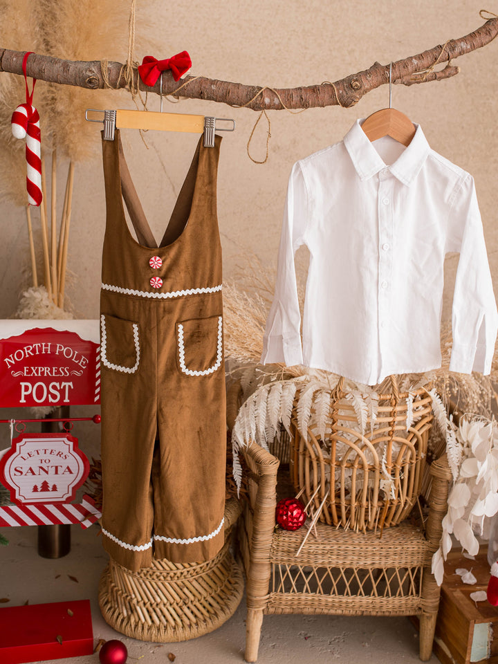 Catch Me If You Can caramel velvet boy overall, hanging with the white shirt on a rattan chair - Before & Ever Kids