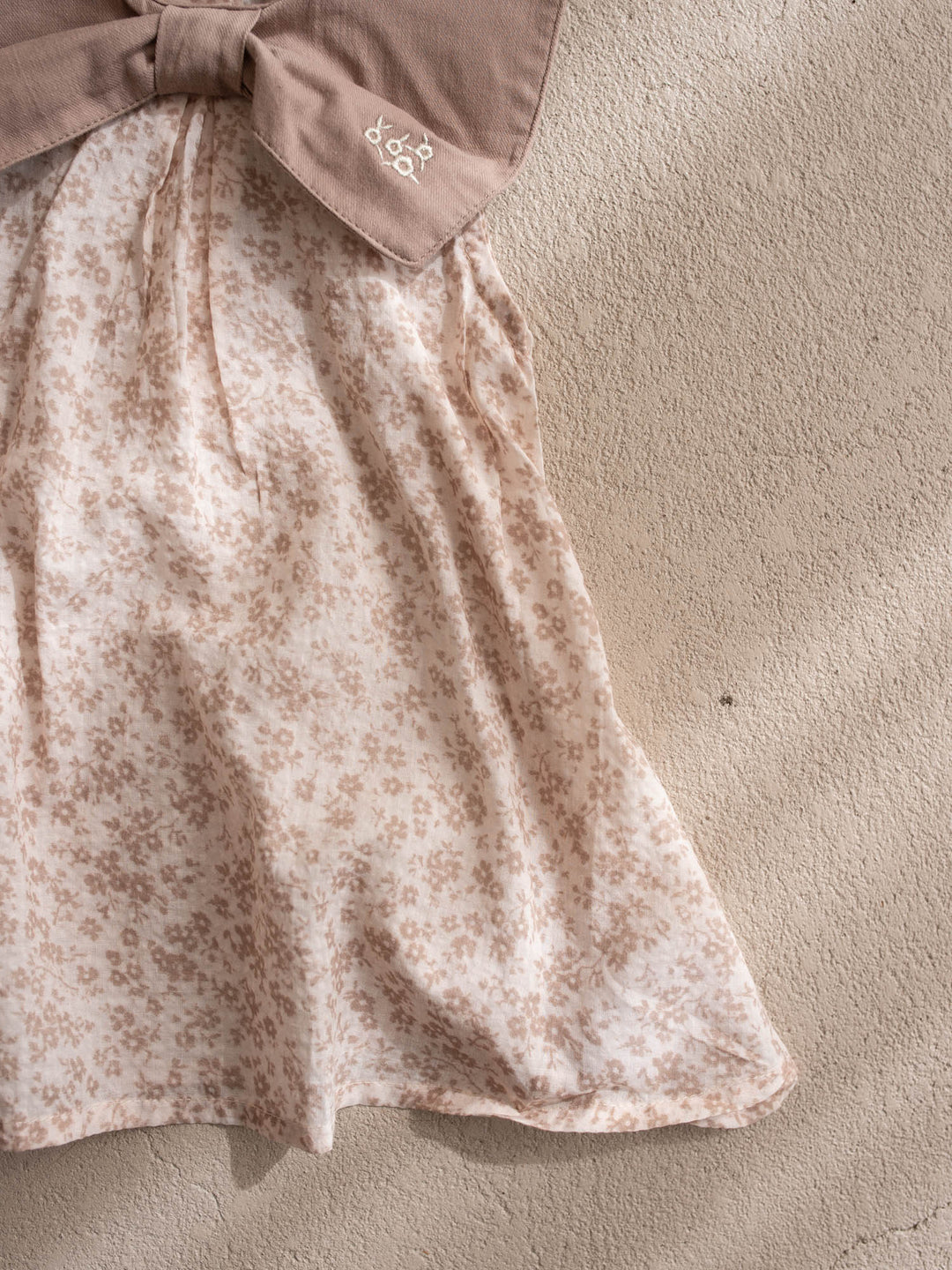 Dainty Miss Hazel Fawn baby girl tan floral cotton dress with oversized embroidered bow collar - Before & Ever Kids