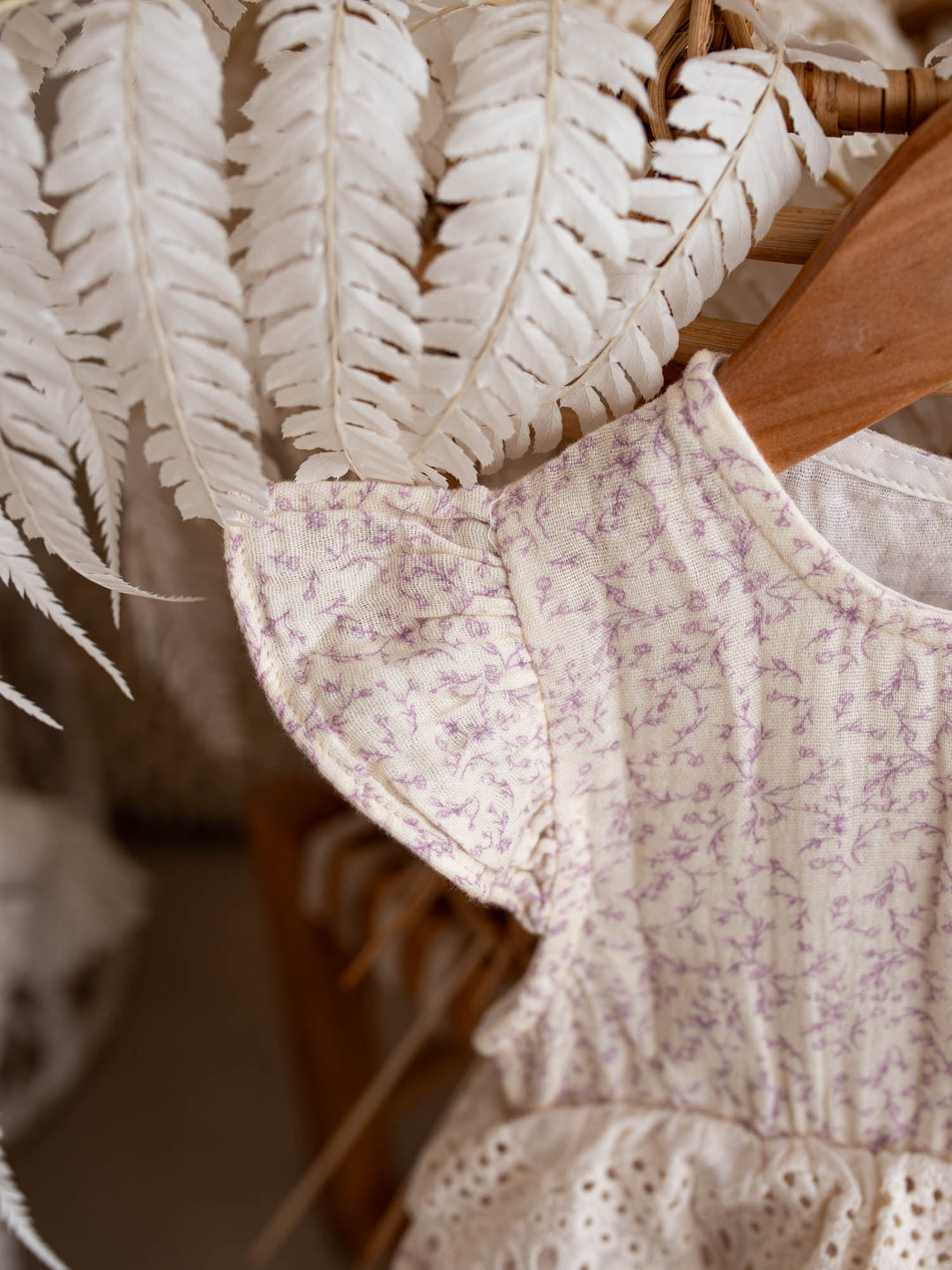 Dainty Miss Lavender Mae baby girl lavender floral cotton gauze romper with eyelet lace ruffle and flutter sleeves - Before & Ever Kids