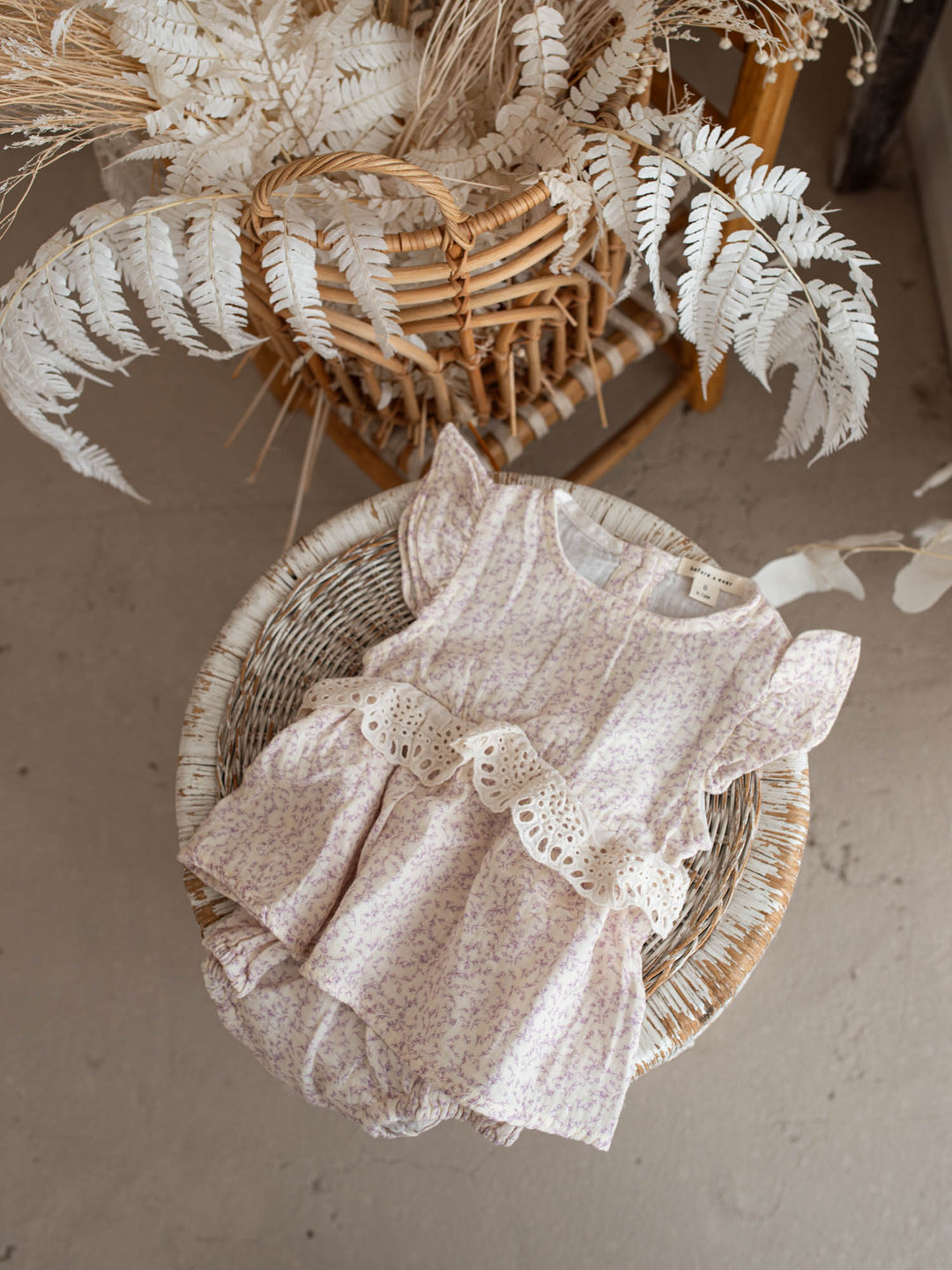 Dainty Miss Lavender Mae baby girl lavender floral cotton gauze romper with eyelet lace ruffle and flutter sleeves - Before & Ever Kids