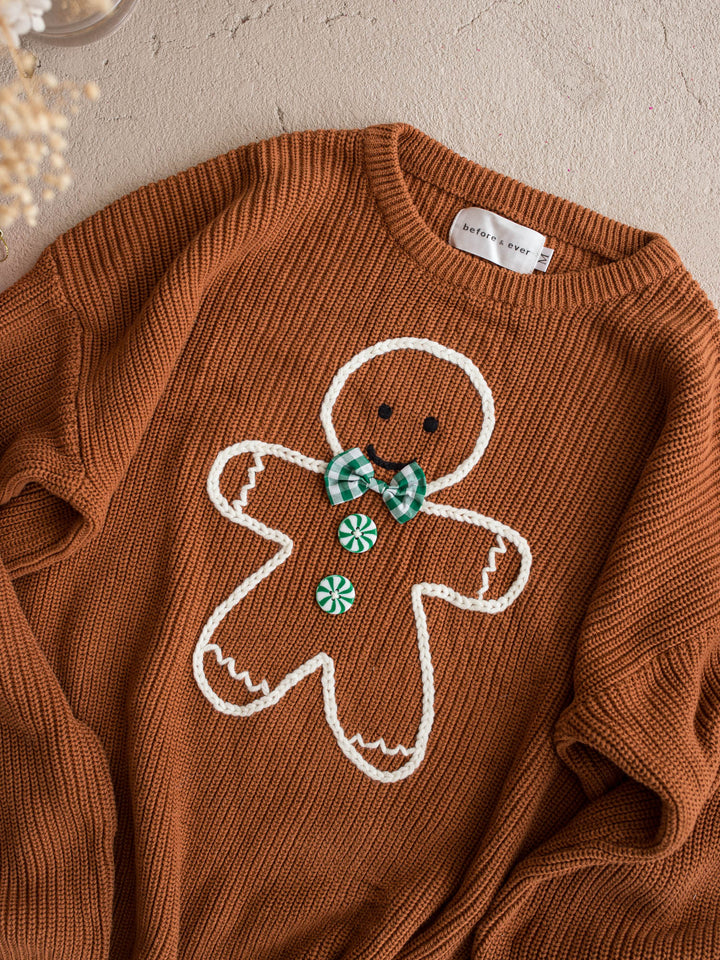 Gingerbread Sweater unisex adult, caramel knit with an embroidered gingerbread boy in a green beanie and scarf - Before & Ever Kids