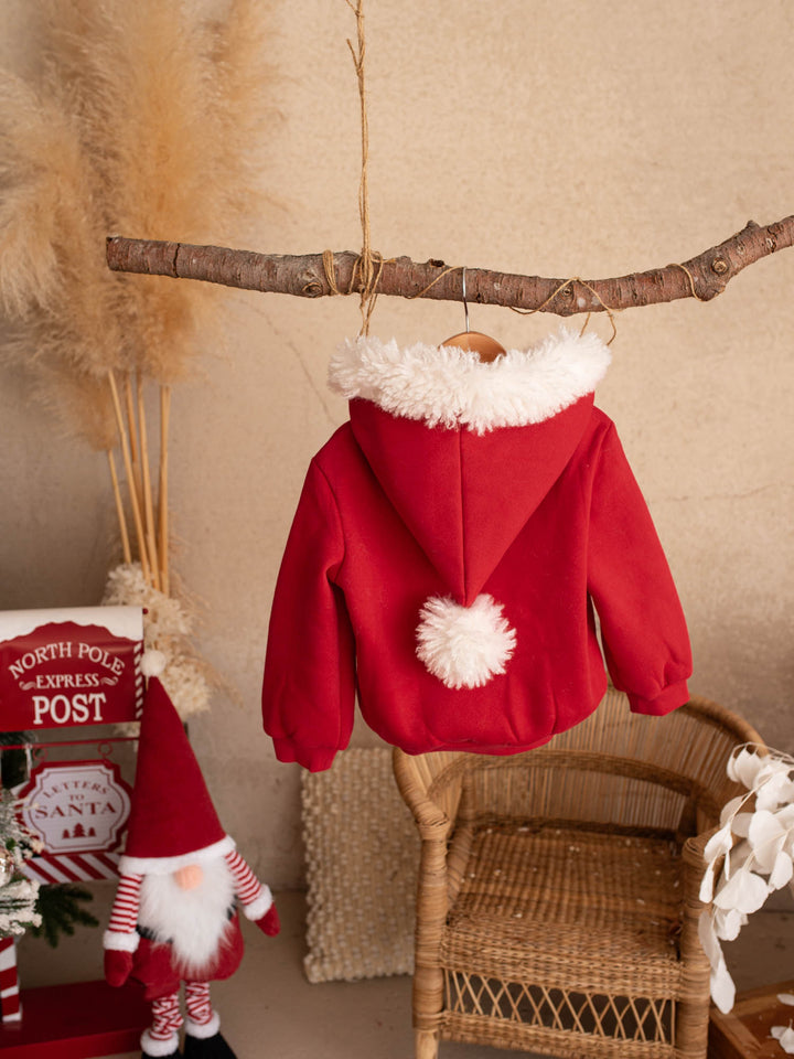 Ho Ho Hoodie red kids hoodie back view showing the Santa hat hood and white pom-pom - Before & Ever Kids