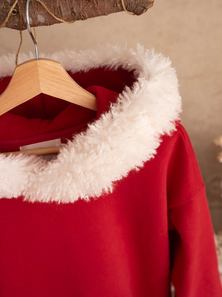 Close up of the white fluffy hood trim on the Ho Ho Hoodie adult - Before & Ever Kids