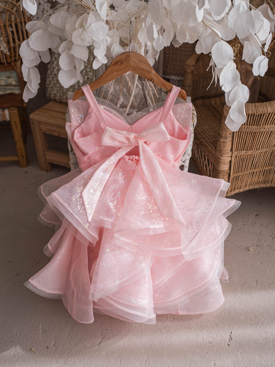 Little Good Witch pink glitter organza dress back view with bow detail - Before & Ever Kids
