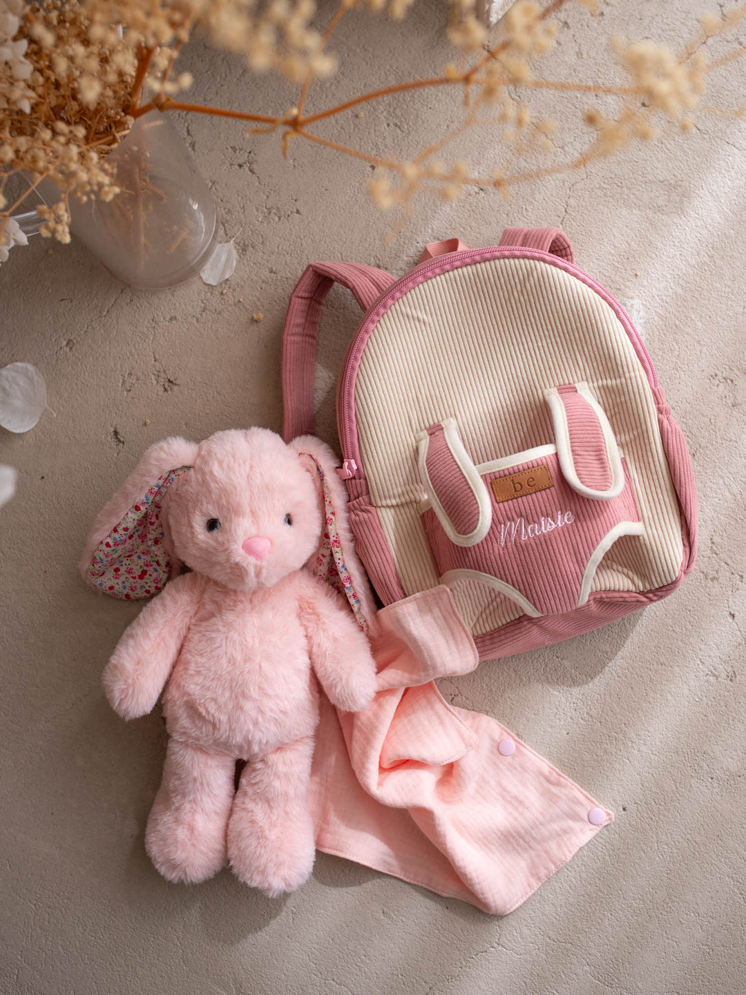 Macie the Bunny personalised Little BFF Companion Backpack, flat lay with the detachable plush and matching comforter