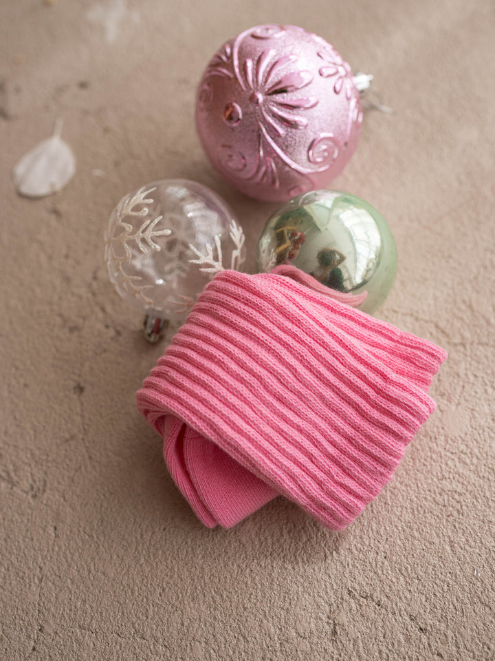 Close up of the ribbed knit on the bubblegum pink socks