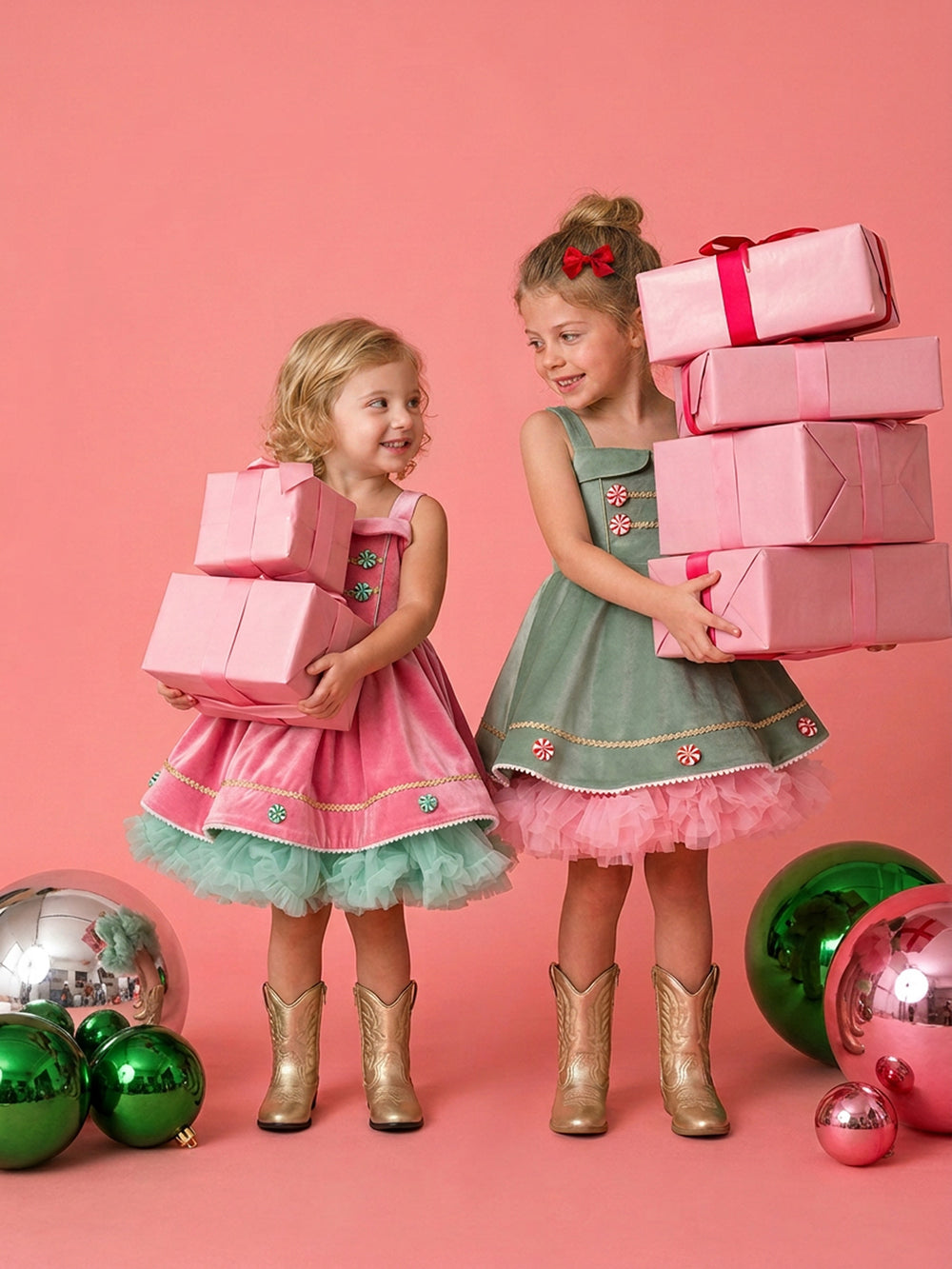 Merry Berry pink and mint worn with gold cowboy boots, pink velvet pinafore with mint peppermint buttons over a mint tulle tutu, shown with the sage green Merry Mint dress - Before & Ever Kids
