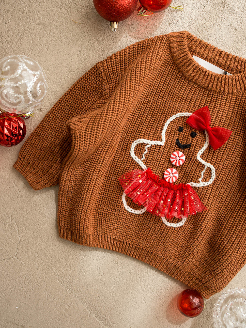 Miss Gingerbread Sweater brown caramel chunky knit sweater with an embroidered gingerbread girl in a red tulle tutu - Before & Ever Kids