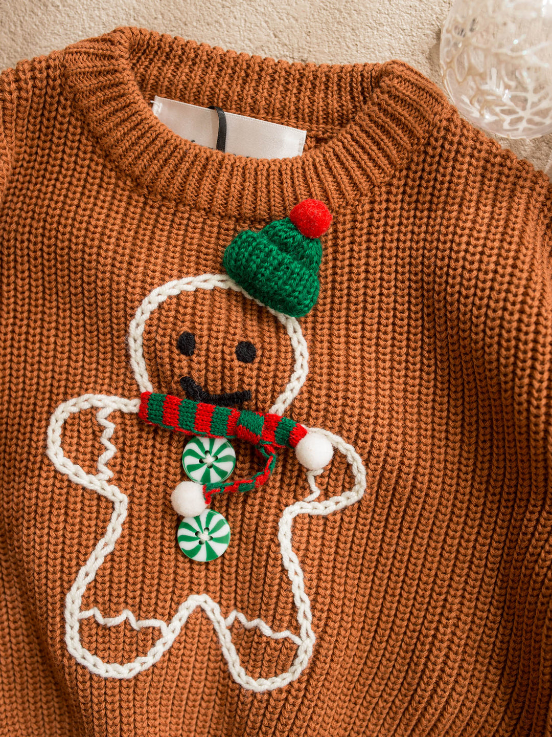 Mr Gingerbread Sweater brown caramel chunky knit sweater with an embroidered gingerbread boy in a green beanie and striped scarf - Before & Ever Kids