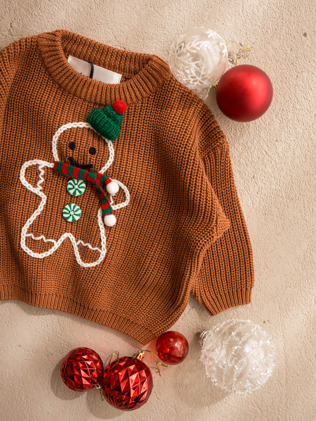 Mr Gingerbread Sweater brown caramel chunky knit sweater with an embroidered gingerbread boy in a green beanie and striped scarf - Before & Ever Kids