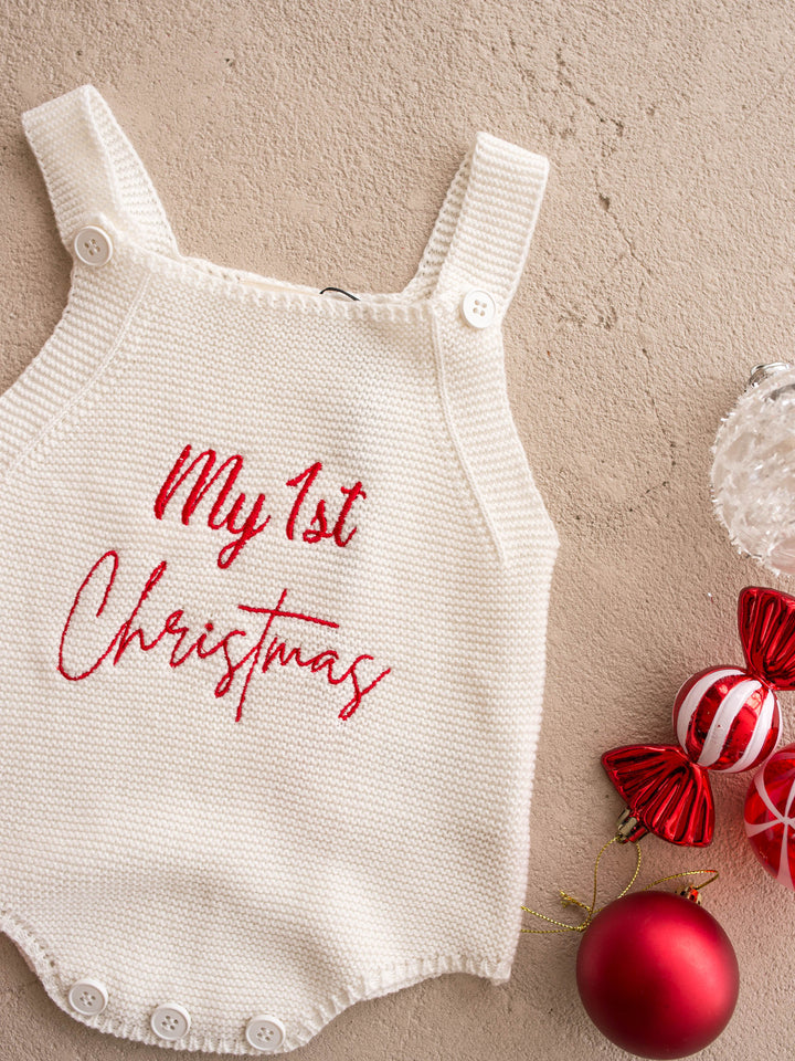 My 1st Christmas Singlet Romper in milk cotton knit with red embroidery, laid flat, full front, red My 1st Christmas embroidery - Before & Ever Kids