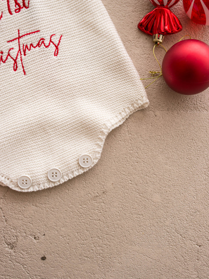 My 1st Christmas Singlet Romper in milk cotton knit with red embroidery, close on the snap base - Before & Ever Kids