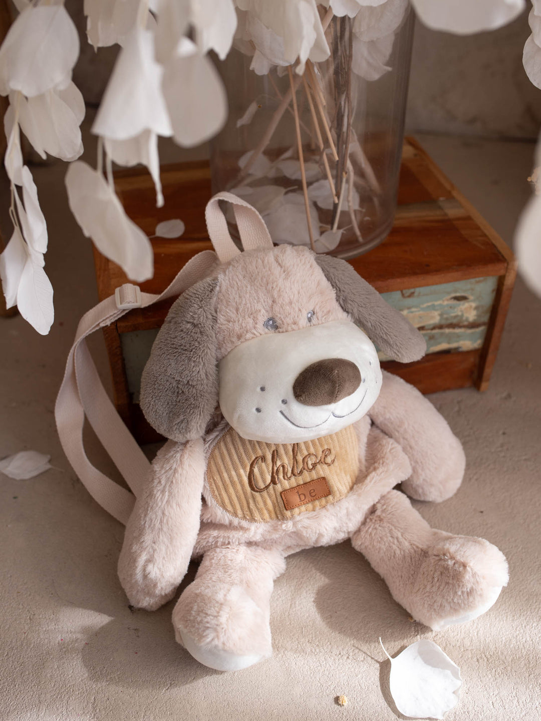 Pip the Puppy personalised Little BFF Sidekick Backpack, seated, with the embroidered name on the corduroy tummy panel