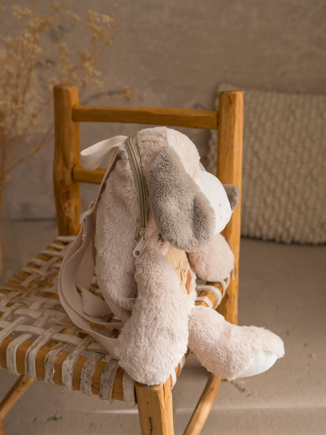 Pip the Puppy personalised plush backpack for kids, side view showing the zip along the back - Before & Ever Kids
