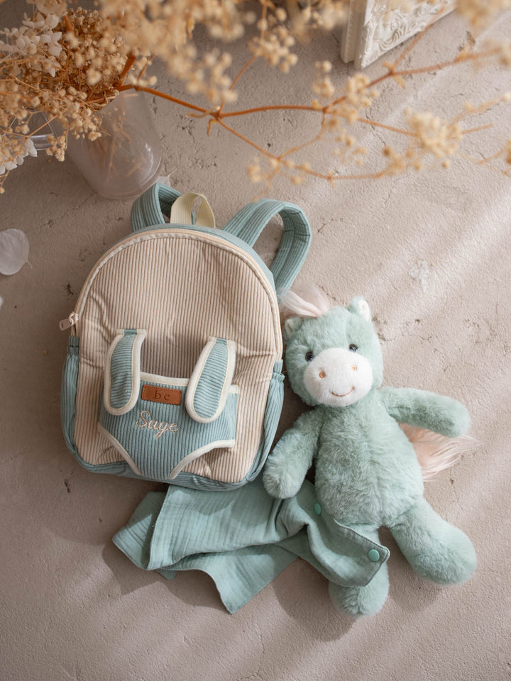 Sage the Horse personalised Little BFF Companion Backpack, shown with the detachable plush and the matching muslin comforter