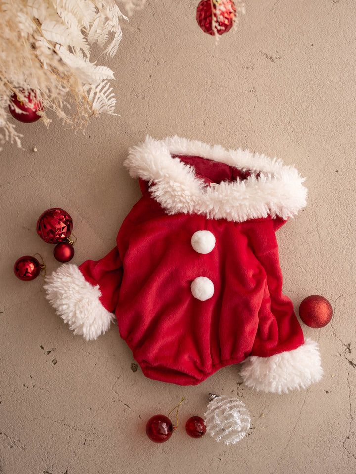 Santa Baby Romper laid flat, front, with red baubles - Before & Ever Kids
