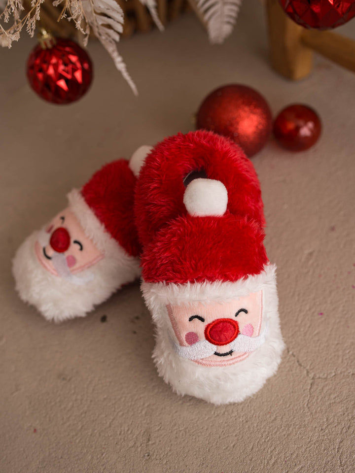 Santa Baby Slippers red fluffy Santa slippers stacked with red baubles - Before & Ever Kids