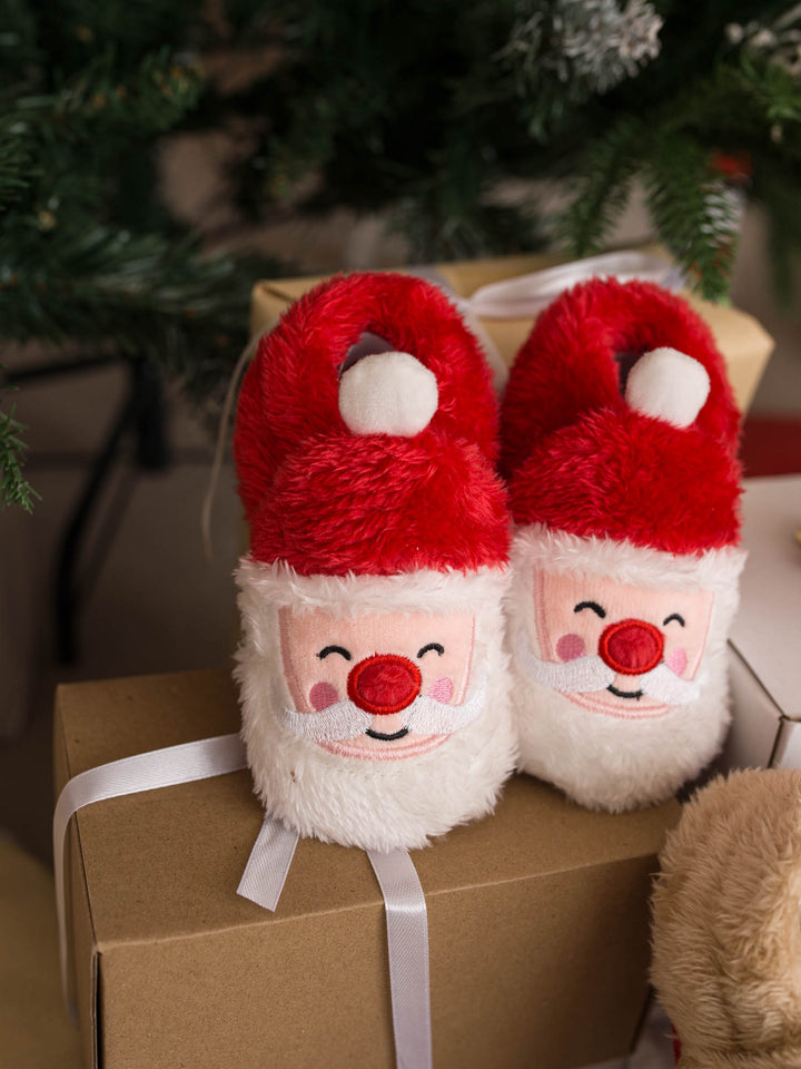 Santa Baby Slippers red fluffy Santa slippers on a gift box - Before & Ever Kids