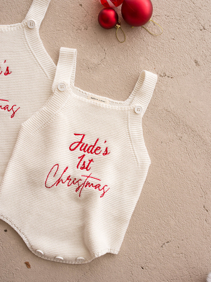 Say My Name Christmas Singlet Romper in milk cotton knit with a personalised name in red, laid flat, full front, personalised name embroidered in red - Before & Ever Kids