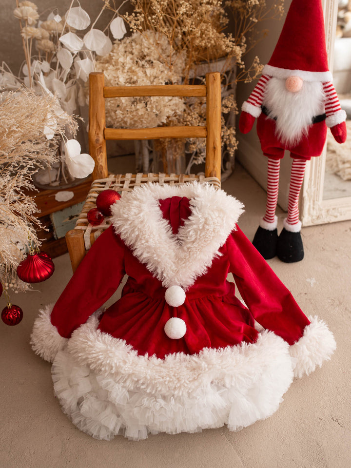 She Came to Sleigh red velvet Santa dress, front view, white fluffy collar and hem, two white pom-poms on the bodice - Before & Ever Kids
