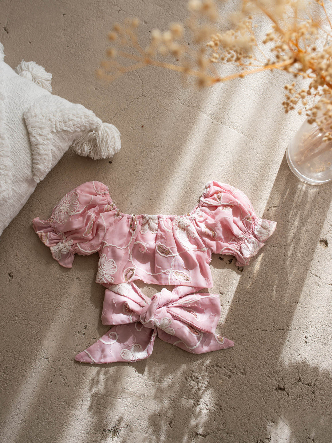 Where Summer Blooms baby pink baby girl set with white floral embroidery, gold sequins, puff sleeves and a bubble-hem skort.